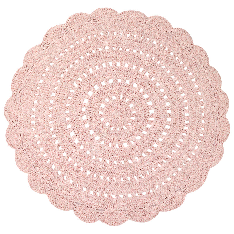 Alma is a round, hand-crocheted rug in a pink nude colour. Alma is available in 8 colors and can easily fit your interior.