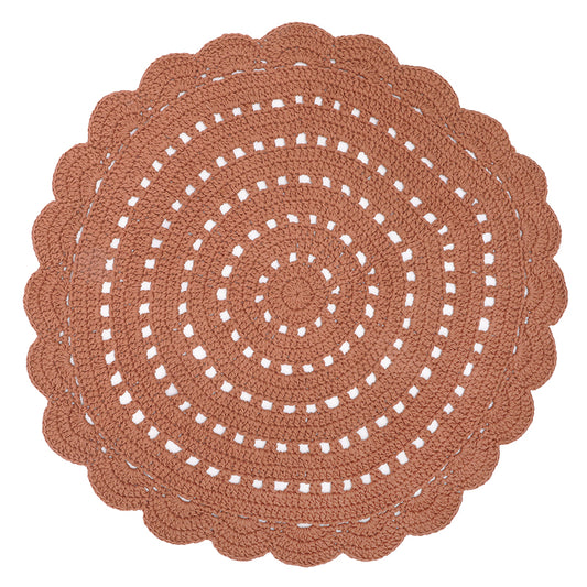 Alma is a round, hand-crocheted rug in amber. It is available in 8 colours to suit your interior.