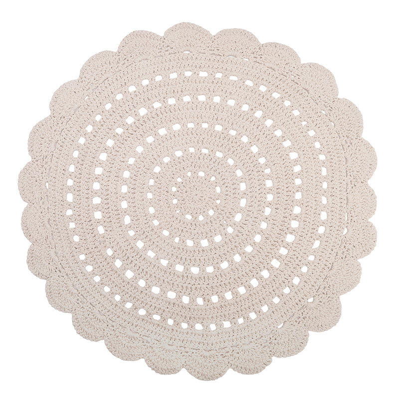 Alma is a round, hand-crocheted rug in a ecu colour.  This rug is available in two sizes.