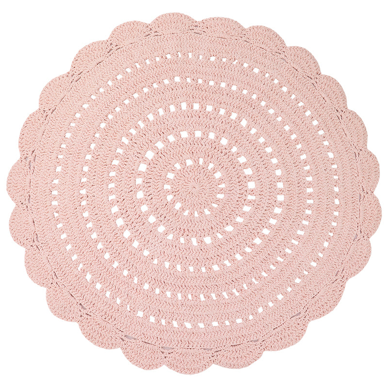 Alma is a round, hand-crocheted rug in a pink nude colour.  Alma is available in 8 colors and can easily fit your interior.