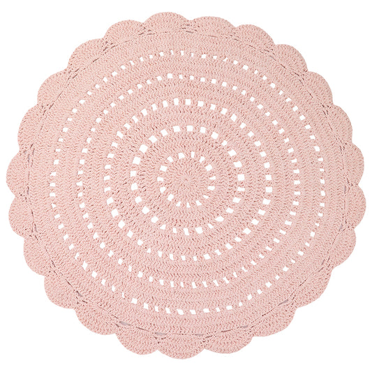 Alma is a round, hand-crocheted rug in a pink nude colour.  Alma is available in 8 colors and can easily fit your interior.