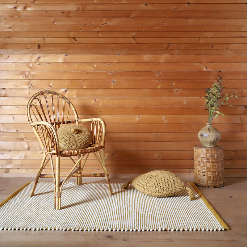 Bergen Mango is a rectangular rug made of a mixture of wool and recycled polyester.