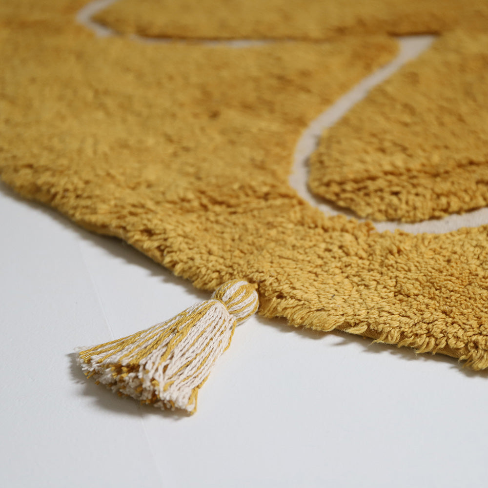 YVA Mango bohemian children's rug with pompoms