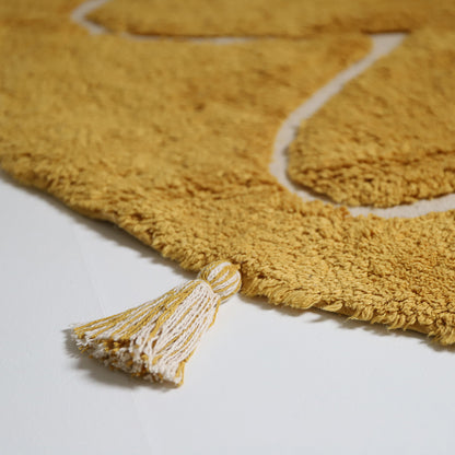 YVA Mango bohemian children's rug with pompoms