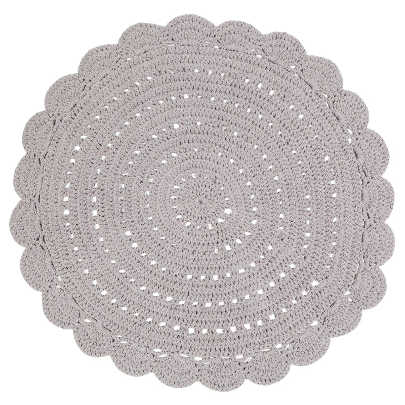 Alma is a round, hand-crocheted rug in a linen colour. Alma is available in 8 colors and can easily fit your interior.